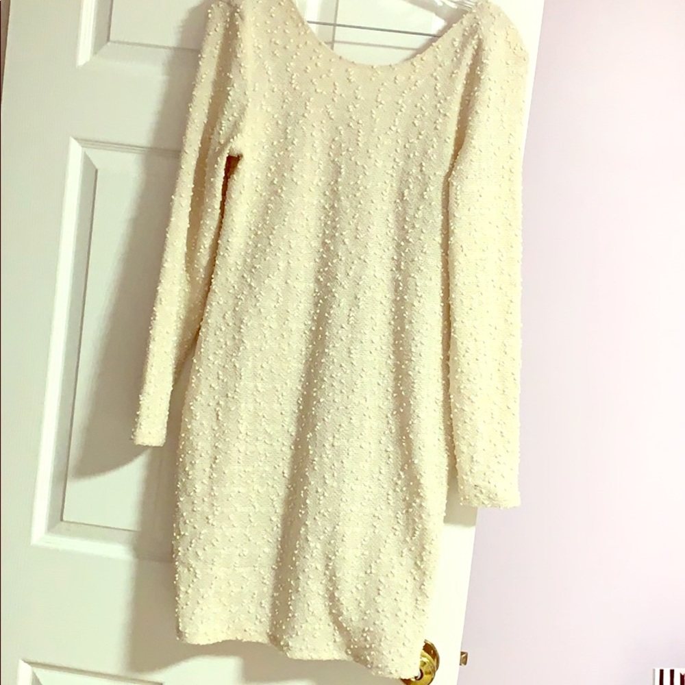 Mini cream color dress.